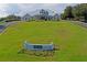Elegant clubhouse with manicured lawns, offering a grand entrance and welcoming atmosphere at 10105 Holly Berry Dr, Weeki Wachee, FL 34613