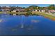 Highlighted in scenic view of a pond, enhancing the beauty and tranquility of the community at 10105 Holly Berry Dr, Weeki Wachee, FL 34613