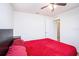 Bedroom with a large window, carpet floors, a ceiling fan, and furniture at 1014 Coastal Hammock Ave, Ruskin, FL 33570