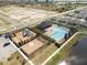 Overhead shot of the neighborhood pool, playground, and surrounding amenities at 1014 Coastal Hammock Ave, Ruskin, FL 33570
