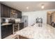 Kitchen featuring stainless steel appliances and granite countertop island at 1014 Coastal Hammock Ave, Ruskin, FL 33570