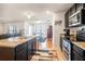 Bright open kitchen with granite countertops and stainless steel appliances at 1014 Coastal Hammock Ave, Ruskin, FL 33570