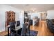 Bright, open floor plan with sleek dining set and a modern kitchen island at 1014 Coastal Hammock Ave, Ruskin, FL 33570