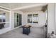 Enclosed patio with a backyard view, fire pit, and tiled floor at 1014 Coastal Hammock Ave, Ruskin, FL 33570