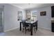 Cozy dining area with backyard views and abundant natural light at 13359 Golden Lime Ave, Spring Hill, FL 34609