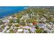 Property with lush backyard, pool, and neighborhood view at 138 Edgewater Ter, Dunedin, FL 34698