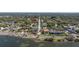 Waterfront property along scenic bay with park, and sidewalk at 138 Edgewater Ter, Dunedin, FL 34698