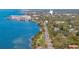 Waterfront property with neighborhood view along a walking path at 138 Edgewater Ter, Dunedin, FL 34698