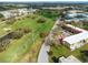 An aerial view of the community and golf course at 2403 Finlandia Ln # 27, Clearwater, FL 33763
