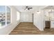 Open concept floor plan showcasing bright living room and modern kitchen with great natural light at 2403 Finlandia Ln # 27, Clearwater, FL 33763