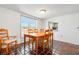 Dining area with natural light, tile flooring, and a clear view to kitchen at 2462 Kingfisher Ln # J203, Clearwater, FL 33762