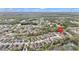 Expansive aerial view of a residential community with well-maintained homes and lush greenery at 25325 Welsh Poppy Way, Land O Lakes, FL 34639