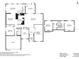 Detailed floor plan showcasing the layout of this 4-bedroom home with living room, kitchen, and garage at 2717 Warwick Ter, Palm Harbor, FL 34685