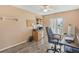 Office featuring a desk, chair, shelving, and a window at 2717 Warwick Ter, Palm Harbor, FL 34685