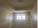 Bright bathroom with shower and a window at 3641 Dickens Dr, Holiday, FL 34691