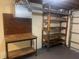 Basement garage featuring ample shelving and workbench space at 3641 Dickens Dr, Holiday, FL 34691