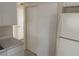 White sliding door pantry adjacent to the kitchen at 3641 Dickens Dr, Holiday, FL 34691