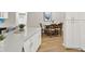 Eat-in kitchen offering quartz countertops and stainless appliances, situated next to the dining area at 3944 Sprucewood Pl, Land O Lakes, FL 34639
