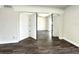 Bedroom with wood-look floors and bi-fold doors at 4036 Cortez Dr # A, Tampa, FL 33614