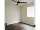 Bedroom featuring modern ceiling fan, wood-look flooring, and a bright window at 4036 Cortez Dr # A, Tampa, FL 33614