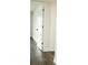 Hallway featuring new laminate flooring and white doors at 4036 Cortez Dr # A, Tampa, FL 33614