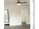 Open main bedroom features a walk-in closet, en-suite bathroom, and laminate floors at 4036 Cortez Dr # A, Tampa, FL 33614