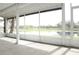 Spacious screened-in patio offering serene views of the lake at 4036 Cortez Dr # A, Tampa, FL 33614