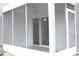 Screened-in patio area with white trim and sliding glass doors at 4036 Cortez Dr # A, Tampa, FL 33614