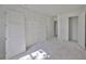 A new bedroom with closet doors, ensuite doors, smooth walls and floors, awaiting finishing touches at 418 W Frances Ave # 1, Tampa, FL 33602