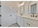 Modern bathroom featuring double sinks, matte black faucets, and stylish lighting fixtures at 418 W Frances Ave # 2, Tampa, FL 33602