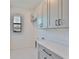 Bright laundry room with white cabinetry, modern fixtures, and a view from the window at 418 W Frances Ave # 2, Tampa, FL 33602
