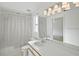 Cozy bathroom featuring a vanity sink, shower-tub combo, and neutral color scheme at 4320 51St S Ave, St Petersburg, FL 33711