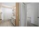 Cozy bathroom with a shower-tub combo, white cabinets, and a neutral color scheme at 4320 51St S Ave, St Petersburg, FL 33711
