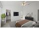 Serene bedroom with a ceiling fan, closet, and ensuite bathroom, offering a private and relaxing retreat at 4320 51St S Ave, St Petersburg, FL 33711