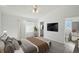 Serene bedroom with a ceiling fan, closet, and ensuite bathroom, offering a private and relaxing retreat at 4320 51St S Ave, St Petersburg, FL 33711