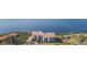 Aerial view of multi-story condo buildings with balconies overlooking the beautiful waterfront at 438 Mariner Dr, Tarpon Springs, FL 34689