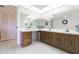 Bathroom with dual sink vanity and large mirror providing ample space and light at 438 Mariner Dr, Tarpon Springs, FL 34689