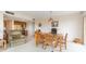 Open living space with a dining area, neutral decor, and seamless flow for entertaining at 438 Mariner Dr, Tarpon Springs, FL 34689