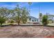 Vacant lot ready for development surrounded by established homes and mature trees in a desirable location at 4610 W Lamb Ave, Tampa, FL 33629