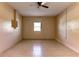 Spacious basement with window and ceiling fan at 5155 Kenmore St, Spring Hill, FL 34608