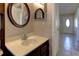 Bathroom sink and a mirror at 5155 Kenmore St, Spring Hill, FL 34608