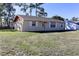 Charming single-story home featuring a well-manicured front lawn at 5155 Kenmore St, Spring Hill, FL 34608