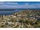Waterfront community aerial view with stunning water views, and well-maintained homes at 5611 Venetian Ne Blvd, St Petersburg, FL 33703