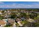 Aerial view of the house with the ocean in the background, the home encircled by a white line at 5611 Venetian Ne Blvd, St Petersburg, FL 33703