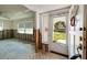 Entryway featuring an open floor plan concept undergoing renovation with view to the front door at 5611 Venetian Ne Blvd, St Petersburg, FL 33703