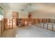 Bare living room displaying wall studs and concrete floor at 5611 Venetian Ne Blvd, St Petersburg, FL 33703