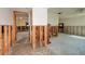 Renovated open living space showing new framework, flooring, and flexible design possibilities at 5611 Venetian Ne Blvd, St Petersburg, FL 33703