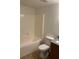 Bathroom features a shower and tub combination and granite countertops at 6011 Skydale Way # 101, Riverview, FL 33578