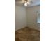 Cozy bedroom with neutral walls, tile flooring, and a window with blinds at 6011 Skydale Way # 101, Riverview, FL 33578