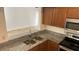 Kitchen with granite countertops and stainless steel appliances at 6011 Skydale Way # 101, Riverview, FL 33578
